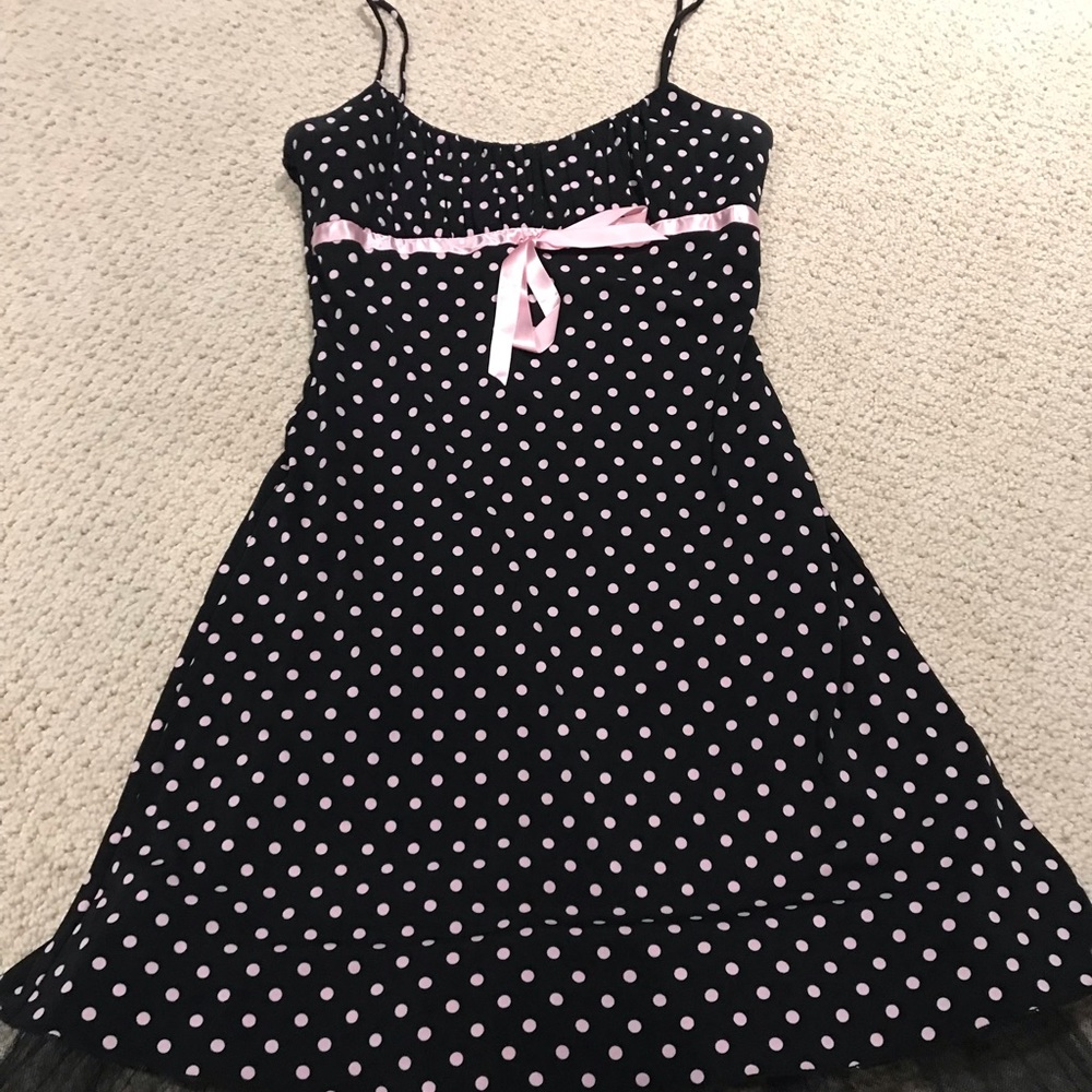 Very adorable polka dot dress with pink ribbon